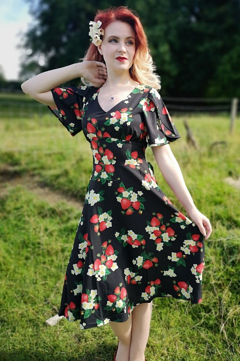 Janice V-Neck Sleeved Tea Dress in Black Strawberry Print